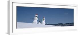 View of Snowmen in Snow Covered Landscape, Waterbury, Vermont, USA-null-Framed Photographic Print