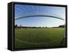 View of Soccer Field Through Goal-Steven Sutton-Framed Stretched Canvas