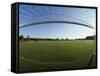 View of Soccer Field Through Goal-Steven Sutton-Framed Stretched Canvas