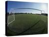 View of Soccer Field Through Goal-Steven Sutton-Stretched Canvas