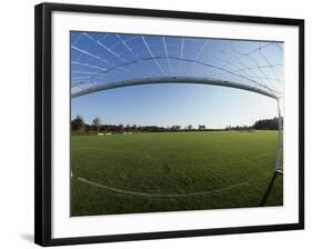 View of Soccer Field Through Goal-Steven Sutton-Framed Photographic Print