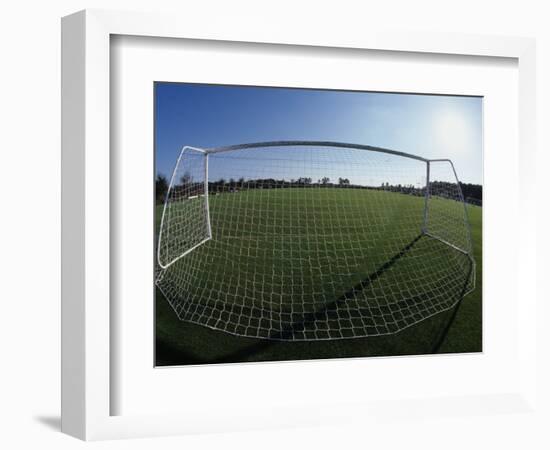 View of Soccer Field Through Goal-Steven Sutton-Framed Photographic Print