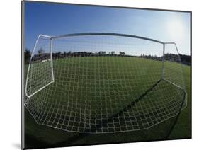 View of Soccer Field Through Goal-Steven Sutton-Mounted Photographic Print