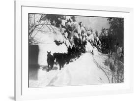 View of Stagecoach Driving through Snowy Mitchell Rd - Downieville, CA-Lantern Press-Framed Premium Giclee Print