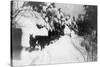 View of Stagecoach Driving through Snowy Mitchell Rd - Downieville, CA-Lantern Press-Stretched Canvas