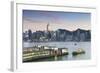 View of Star Ferry Terminal and Hong Kong Island Skyline at Dusk, Hong Kong, China, Asia-Ian Trower-Framed Photographic Print