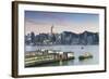 View of Star Ferry Terminal and Hong Kong Island Skyline at Dusk, Hong Kong, China, Asia-Ian Trower-Framed Photographic Print