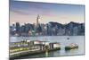 View of Star Ferry Terminal and Hong Kong Island Skyline at Dusk, Hong Kong, China, Asia-Ian Trower-Mounted Photographic Print