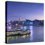 View of Star Ferry Terminal and Hong Kong Island skyline, Hong Kong, China-Ian Trower-Stretched Canvas