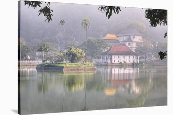 View of Temple across Kandy Lake-Jon Hicks-Stretched Canvas