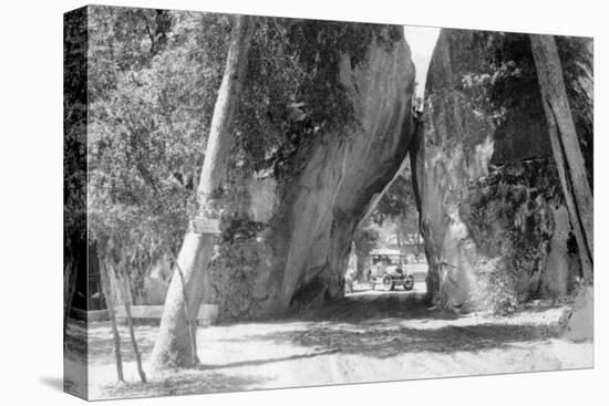 View of the Arch Rock Entrance, Model-T Ford Parked - Yosemite National Park, CA-Lantern Press-Stretched Canvas