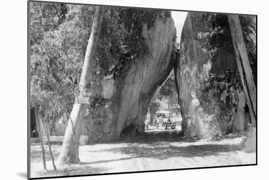 View of the Arch Rock Entrance, Model-T Ford Parked - Yosemite National Park, CA-Lantern Press-Mounted Art Print