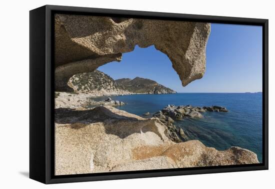 View of the Blue Sea from a Natural Sea Cave of Rocks Shaped by Wind, Punta Molentis, Villasimius-Roberto Moiola-Framed Stretched Canvas