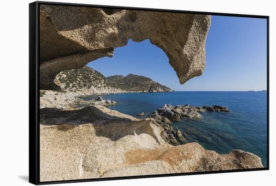 View of the Blue Sea from a Natural Sea Cave of Rocks Shaped by Wind, Punta Molentis, Villasimius-Roberto Moiola-Framed Stretched Canvas