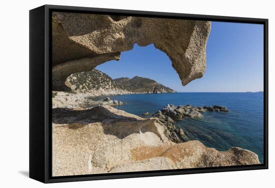 View of the Blue Sea from a Natural Sea Cave of Rocks Shaped by Wind, Punta Molentis, Villasimius-Roberto Moiola-Framed Stretched Canvas