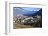 View of the city of Chur surrounded by woods and snowy peaks, district of Plessur, Canton of Graubu-Roberto Moiola-Framed Photographic Print