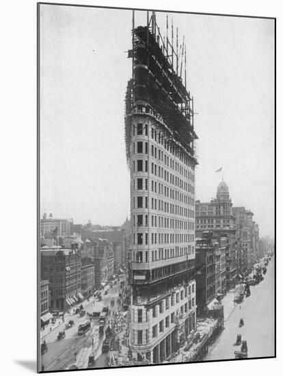 View of the Flatiron Building under Construction in New York City-null-Mounted Photographic Print