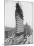 View of the Flatiron Building under Construction in New York City-null-Mounted Photographic Print