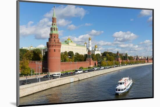 View of the Kremlin, UNESCO World Heritage Site, on the banks of the Moscow River, Moscow, Russia,-Miles Ertman-Mounted Photographic Print