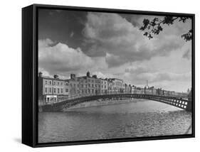 View of the Liffey River and the Metal Bridge in Dublin-Hans Wild-Framed Stretched Canvas