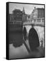 View of the Liffey River and the Metal Bridge in Dublin-Hans Wild-Framed Stretched Canvas