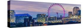 View of the London Eye and rooftop of Waterloo Station at dusk, Waterloo, London, England-Frank Fell-Stretched Canvas