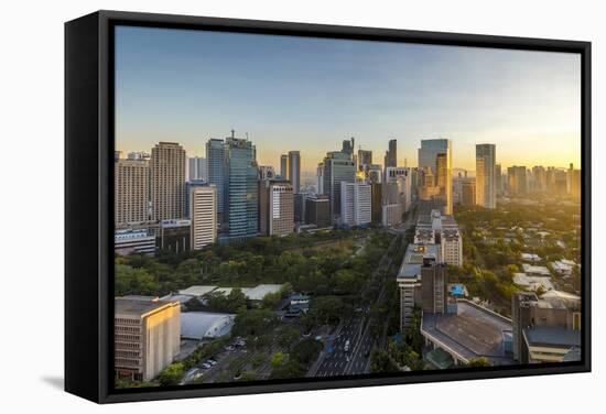 View of the Makati District in Manila at Sunrise, Philippines, Southeast Asia, Asia-Andrew Sproule-Framed Stretched Canvas