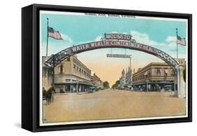 View of the Modesto Welcoming Arch - Modesto, CA-Lantern Press-Framed Stretched Canvas