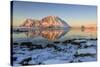 View of the Mountains of Gymsoya (Gimsoya) from Smorten Reflected in the Clear Partially Frozen Sea-Roberto Moiola-Stretched Canvas