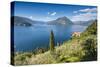 View of the typical village of Varenna and Lake Como surrounded by mountains, Italian Lakes, Italy-Roberto Moiola-Stretched Canvas
