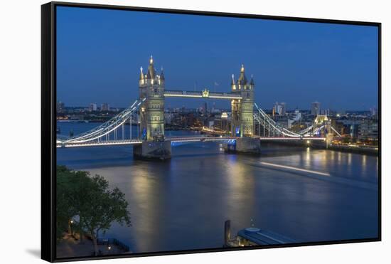 View of Tower Bridge and River Thames from Cheval Three Quays at dusk, London, England-Frank Fell-Framed Stretched Canvas