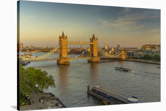 View of Tower Bridge and River Thames from Cheval Three Quays at sunset, London, England-Frank Fell-Stretched Canvas