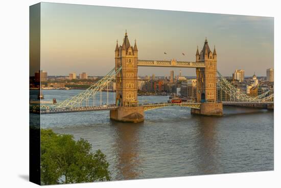 View of Tower Bridge and River Thames from Cheval Three Quays at sunset, London, England-Frank Fell-Stretched Canvas