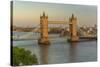 View of Tower Bridge and River Thames from Cheval Three Quays at sunset, London, England-Frank Fell-Stretched Canvas