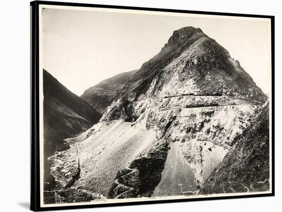 View of Two Railroad Trains on Tracks Along a Mountain, Presumably on or Near the Panama Canal,…-Byron Company-Stretched Canvas