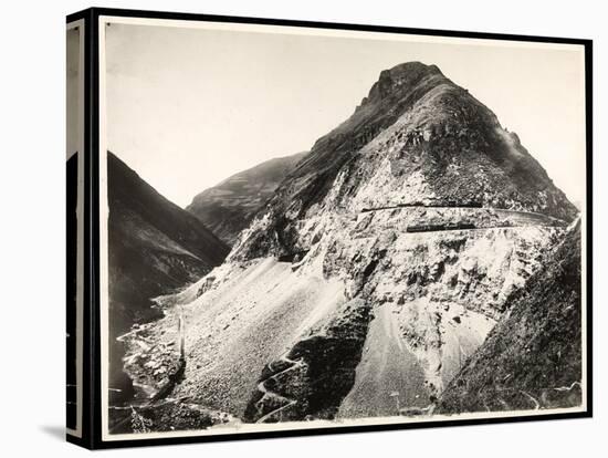 View of Two Railroad Trains on Tracks Along a Mountain, Presumably on or Near the Panama Canal,…-Byron Company-Stretched Canvas
