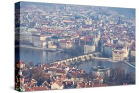 View of typical buildings and ancient churches framed by the River Vltava, Prague, Czech Republic, -Roberto Moiola-Stretched Canvas