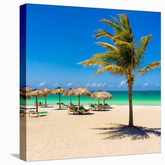 View of Varadero Beach in Cuba with a Coconut Tree, Umbrellas and a Beautiful Turquoise Ocean-Kamira-Stretched Canvas