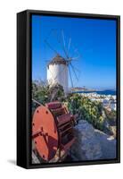 View of whitewashed windmill overlooking town, Mykonos Town, Mykonos, Cyclades Islands, Aegean Sea-Frank Fell-Framed Stretched Canvas