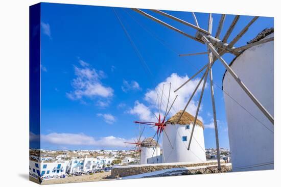 View of windmills and town in background, Mykonos Town, Mykonos, Cyclades Islands, Aegean Sea-Frank Fell-Stretched Canvas