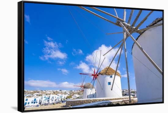 View of windmills and town in background, Mykonos Town, Mykonos, Cyclades Islands, Aegean Sea-Frank Fell-Framed Stretched Canvas