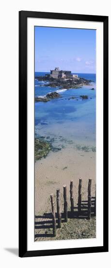 View of Wooden Posts on the Beach with a Fort in the Background, St-Malo, Brittany, France-null-Framed Photographic Print