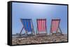 View of Worthing Pier and colourful deckchairs on Worthing Beach, Worthing, West Sussex, England-Frank Fell-Framed Stretched Canvas