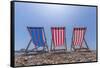 View of Worthing Pier and colourful deckchairs on Worthing Beach, Worthing, West Sussex, England-Frank Fell-Framed Stretched Canvas