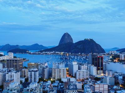 https://imgc.allpostersimages.com/img/posters/view-over-botafogo-towards-the-sugarloaf-mountain-at-twilight-rio-de-janeiro-brazil-south-americ_u-L-Q1BTOGS0.jpg?artPerspective=n