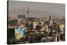 View over buildings from city centre towards Alborz Mountains, Tehran, Iran, Middle East-James Strachan-Stretched Canvas