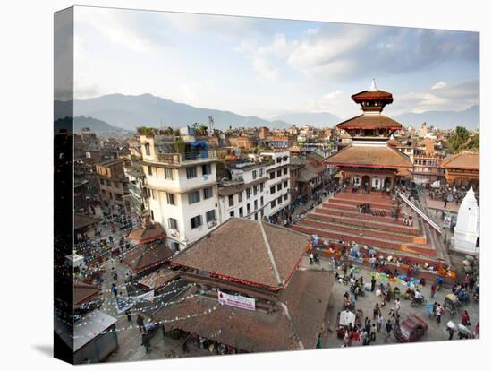 View over Durbar Square from Rooftop Cafe Showing Temples and Busy Streets, Kathmandu, Nepal, Asia-Lee Frost-Stretched Canvas