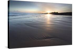 View over Embleton Beach at Sunrise Towards the Silhouetted Ruin of Dunstanburgh Castle-Lee Frost-Stretched Canvas