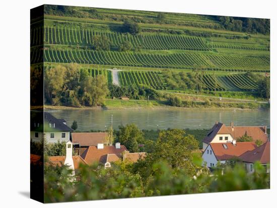 View over historic village Spitz towards the vineyards near Hofarnsdorf-Martin Zwick-Stretched Canvas