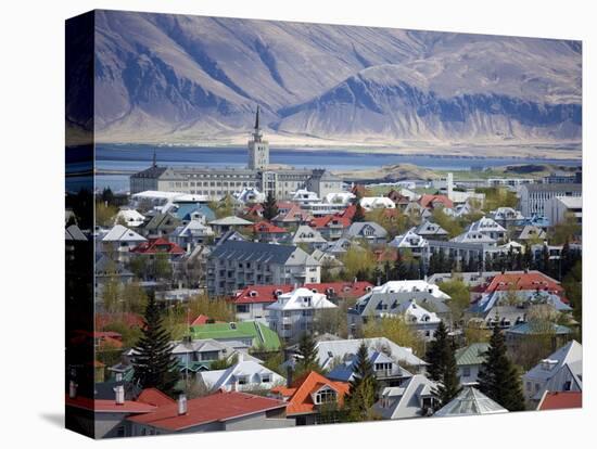 View Over Reykjavik With Mountains Looming in the Distance, Reykjavik, Iceland, Polar Regions-Lee Frost-Stretched Canvas